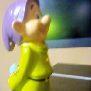 Disney Figurine with Purple and Yellow Colors